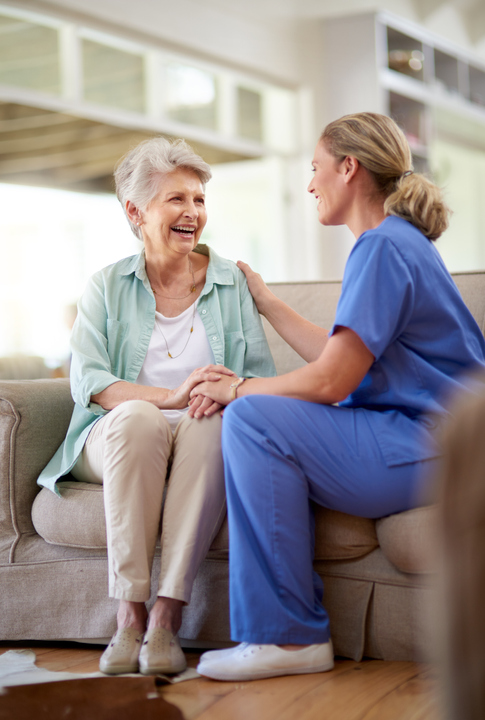 Caregiver and elderly woman