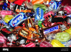 An assortment of candy, including Snickers and Milky Way.
