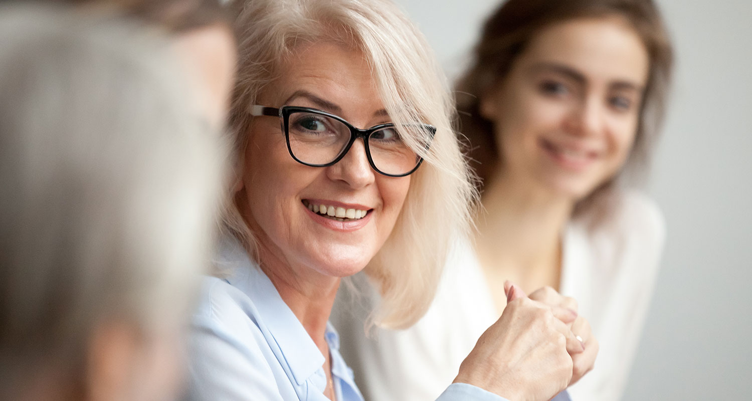 Elderly Woman Wearing Glasses And Smiling