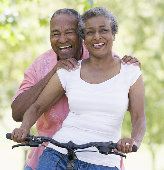 Senior Couple On A Bicycle